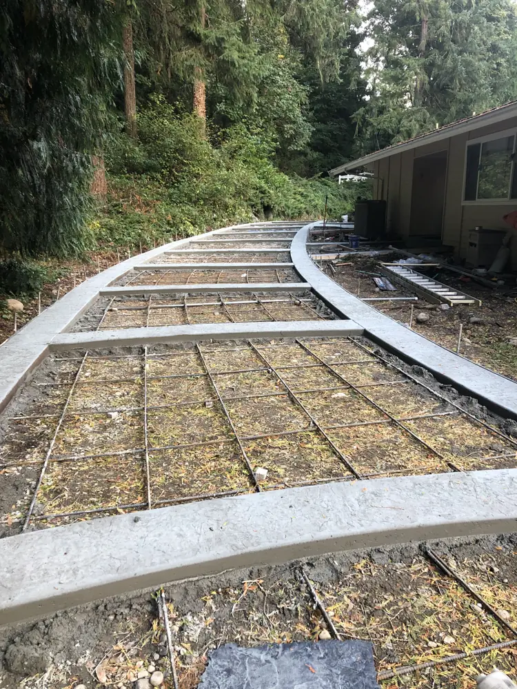 Curved driveway with borders, forms and rebar
