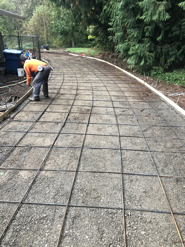 Forms and rebar on a curved drive